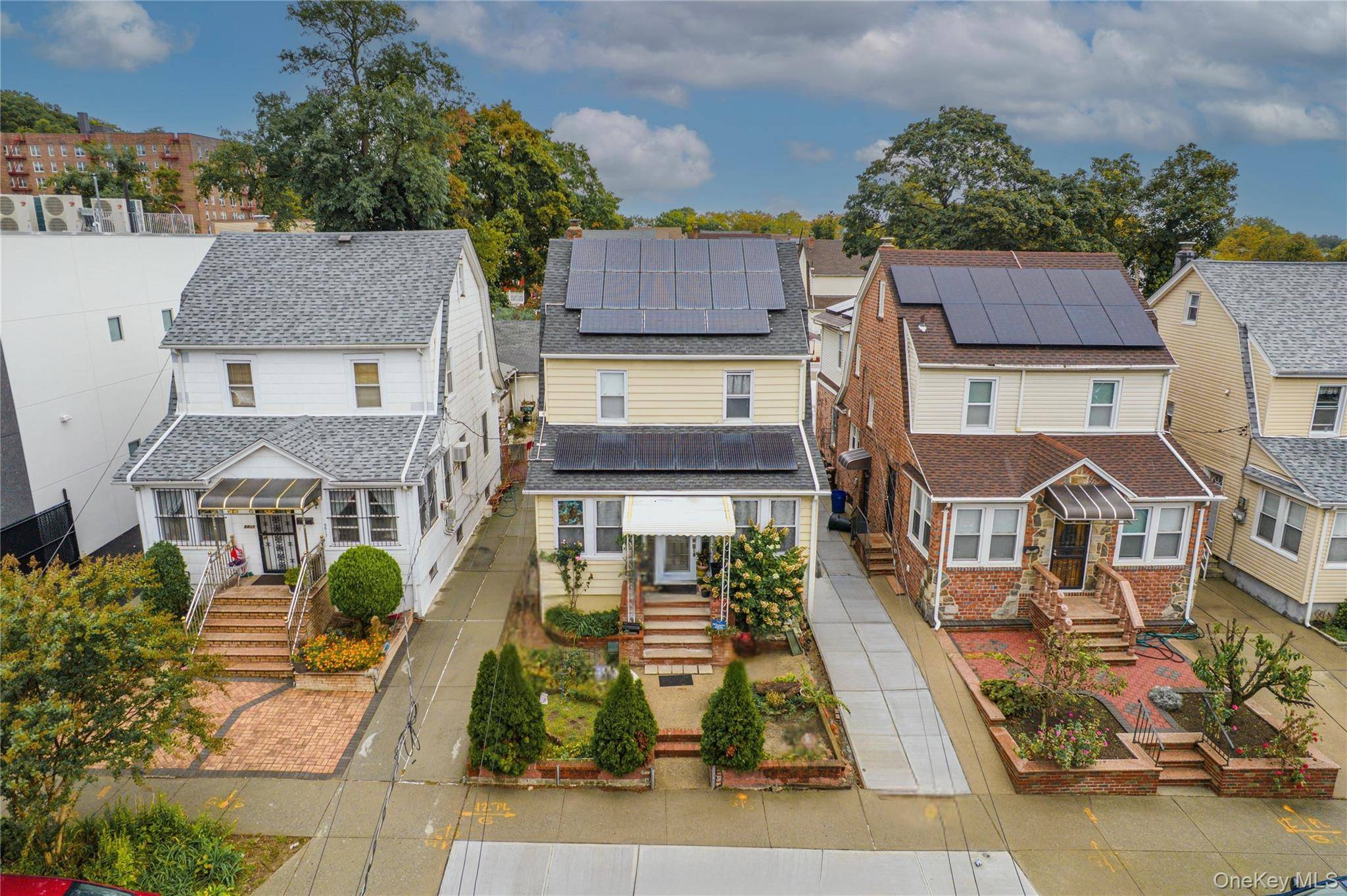 Welcome to this beautifully maintained home in the desirable Jamaica Estates section of Hollis.