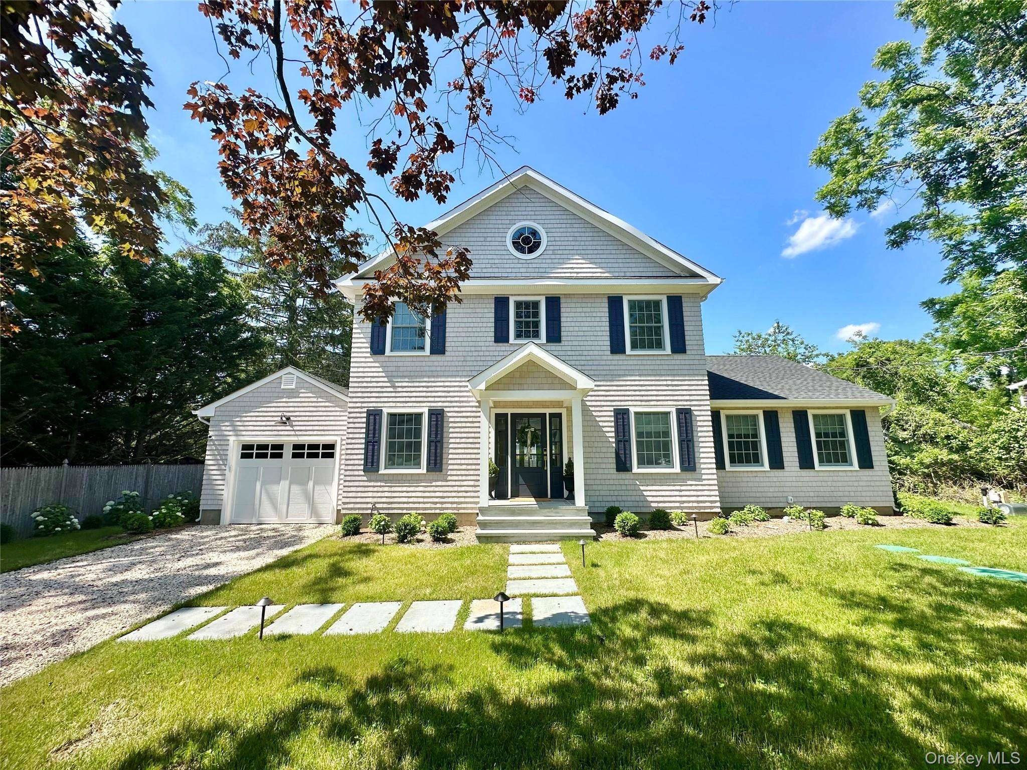 Nestled in the heart of Bellport Village, this exquisite 3 bedroom, 3.