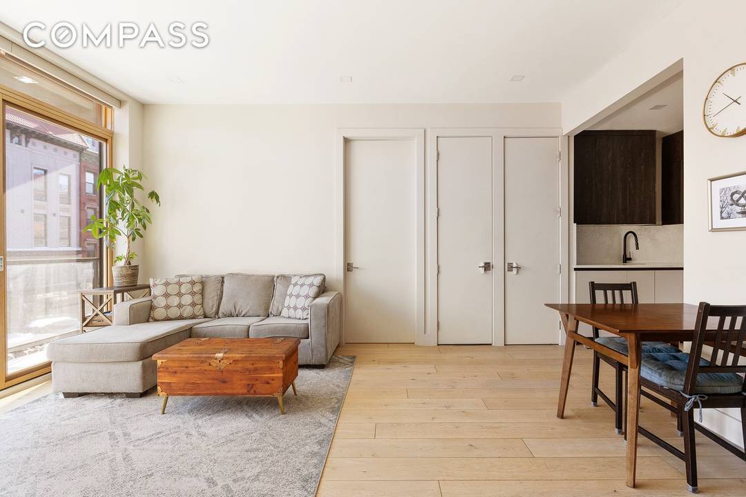 This well appointed two bedroom condominium offers a contemporary approach to modern living, pairing clean architectural lines with carefully selected finishes throughout.