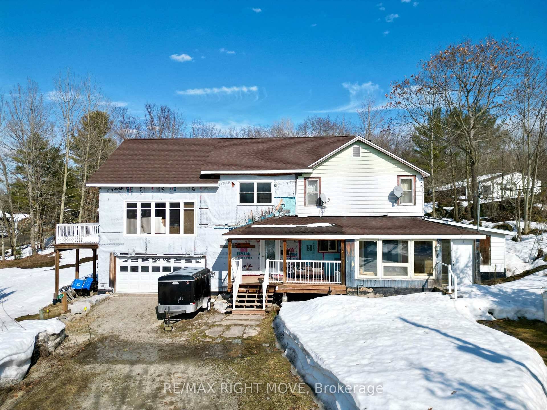 Nestled just a stones throw from the picturesque MacLean Lake, this expansive 2, 800 sq.