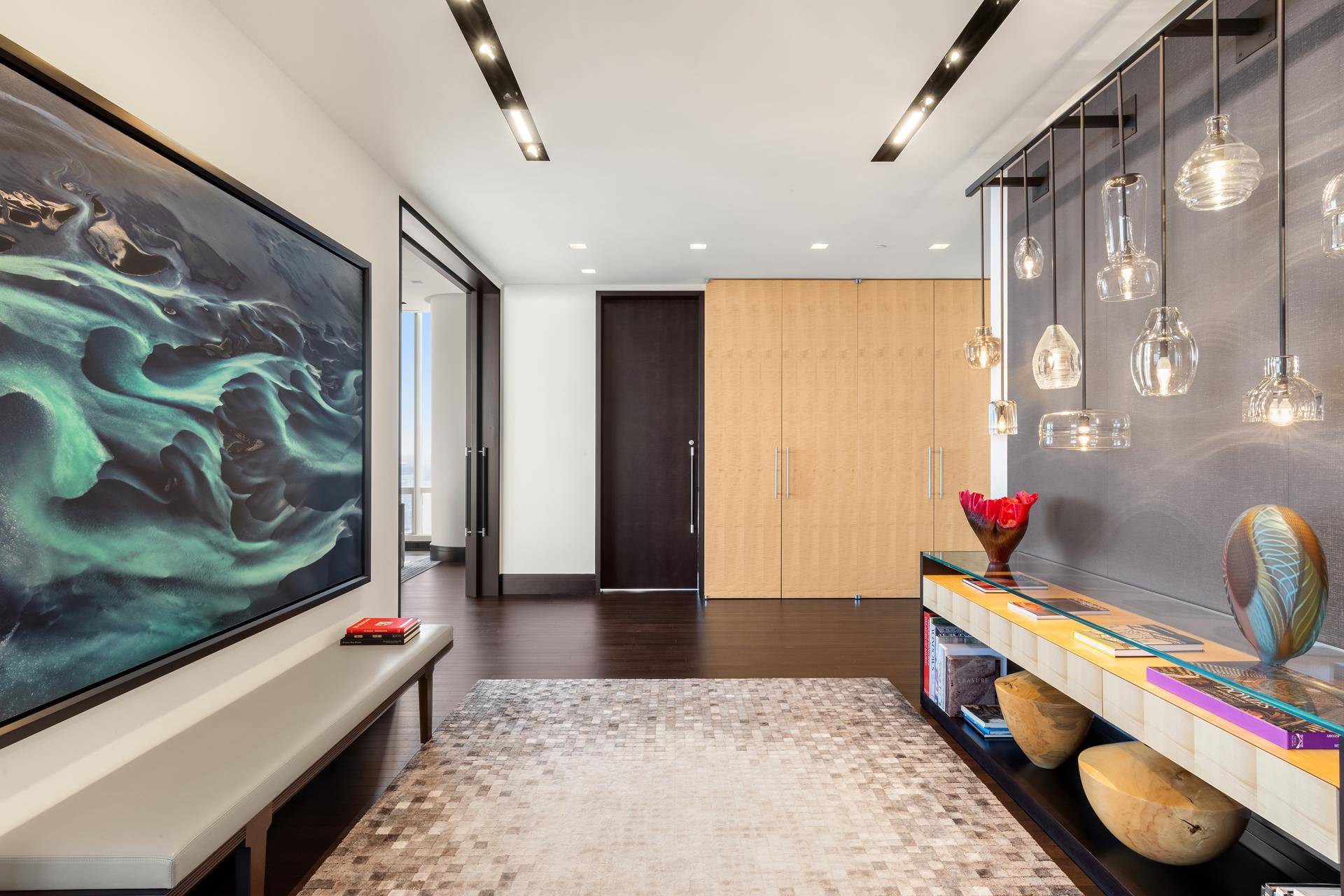 Soaring high above Midtown, comprising the entire 81st floor, this trophy penthouse residence at the premier One57 condominium tower is a masterpiece of design and luxury.