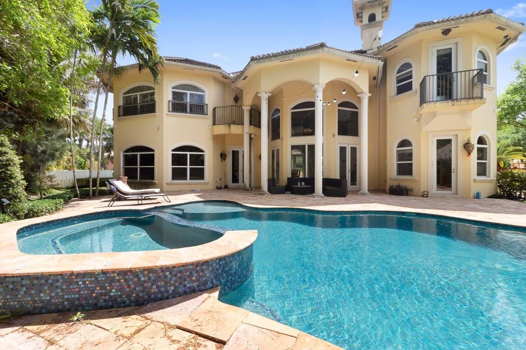 Indulge in unrivaled luxury within the largest home in this prestigious community.