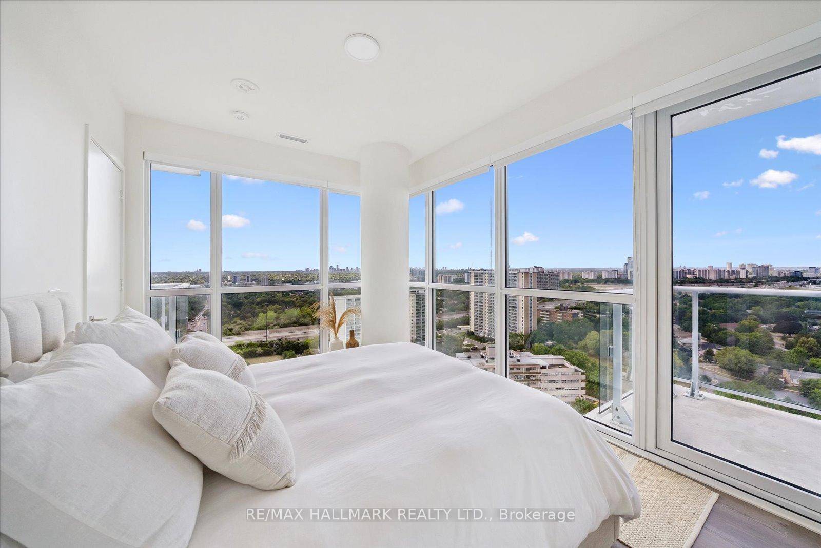 Welcome to this rare sun drenched corner unit with spectacular southwest views !