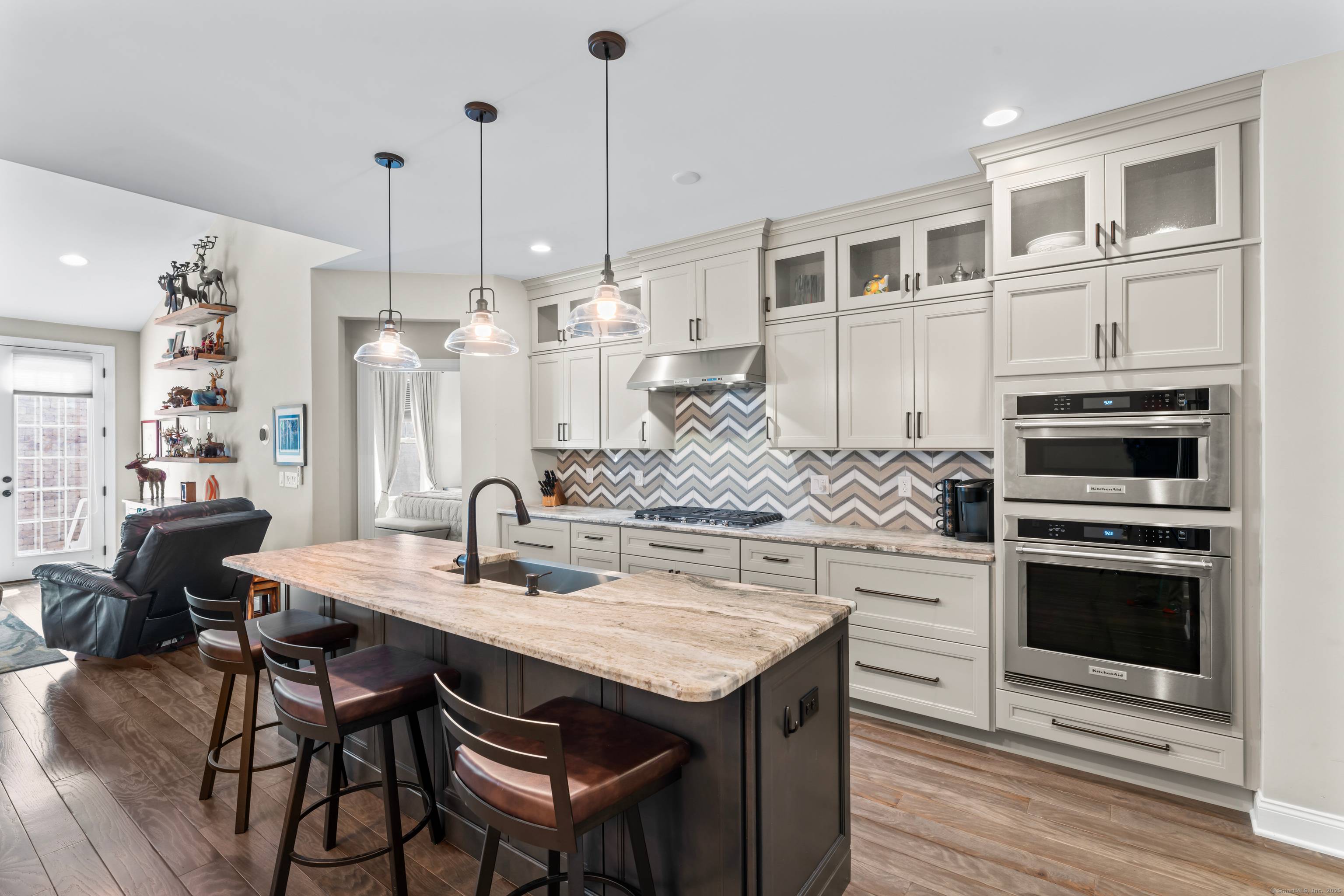 Welcome to 63 Great Hill Drive, a stunning townhome in The Summit at Bethel, a premier active adult luxury community with resort style amenities and maintenance free living.