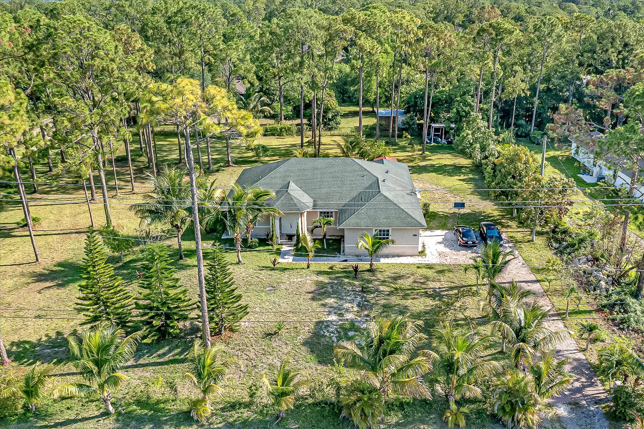 AMAZING ! Tucked away on a quiet dead end street and adjacent to the canal, this hidden gem sits on nearly 1.