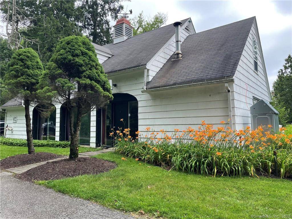 Charming 2 story 4 BR, 2BA Carriage House in coveted location near center of town.