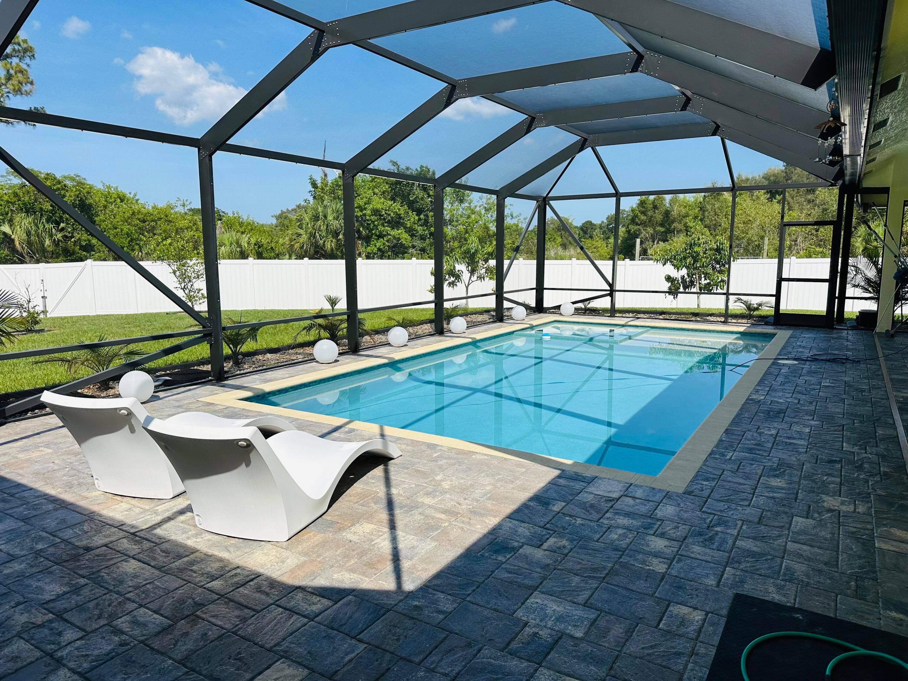 Stunning 4 Bedroom, 3 Bath Pool Home on a Spacious Corner LotWelcome to your dream home !