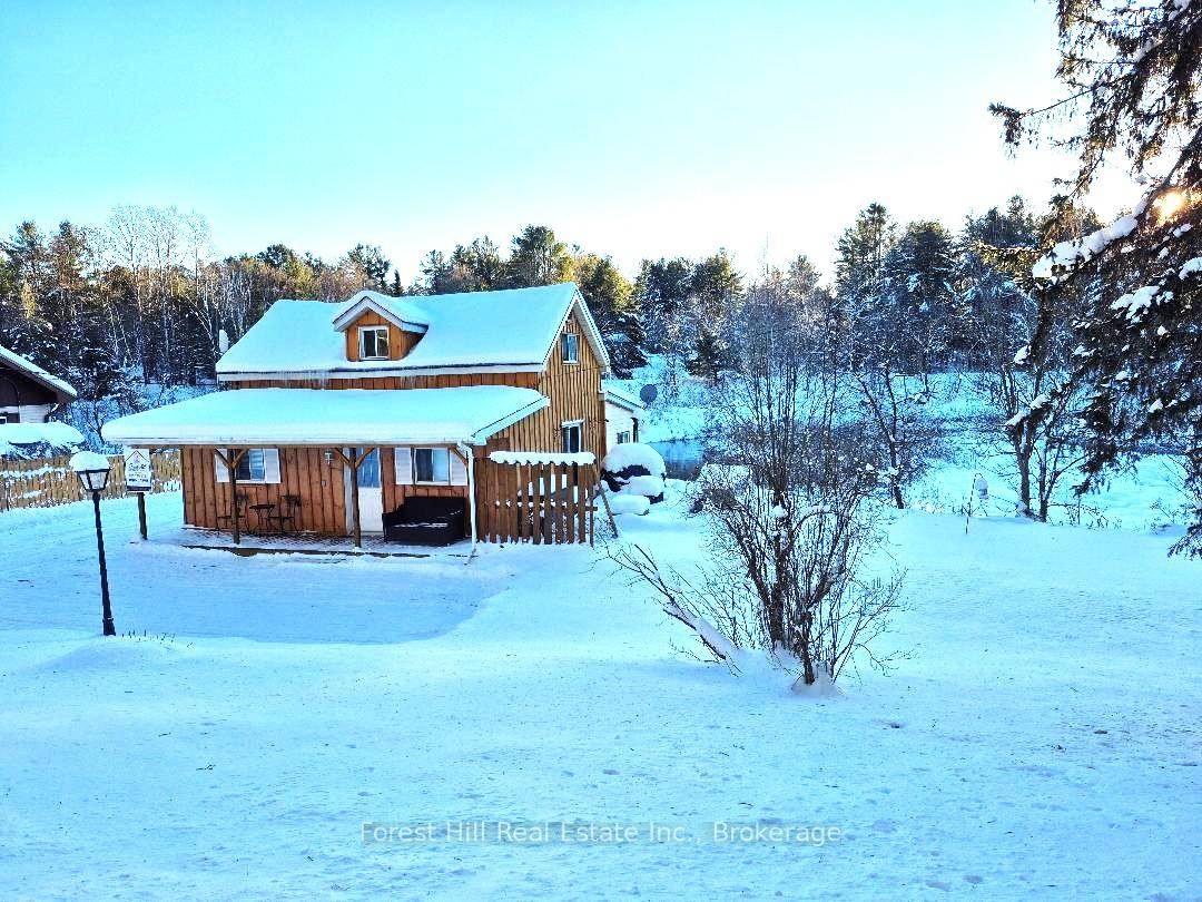 Affordable three bedroom home on the Boyne River, perfect for first time home buyers, with a newer drilled well.