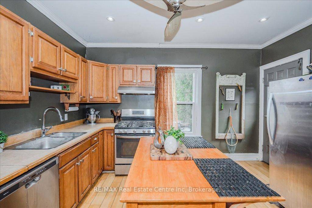 265 London Rd W is nestled in one of Guelphs most sought after central neighbourhoods, situated on a huge lot with incredible outdoor potential !