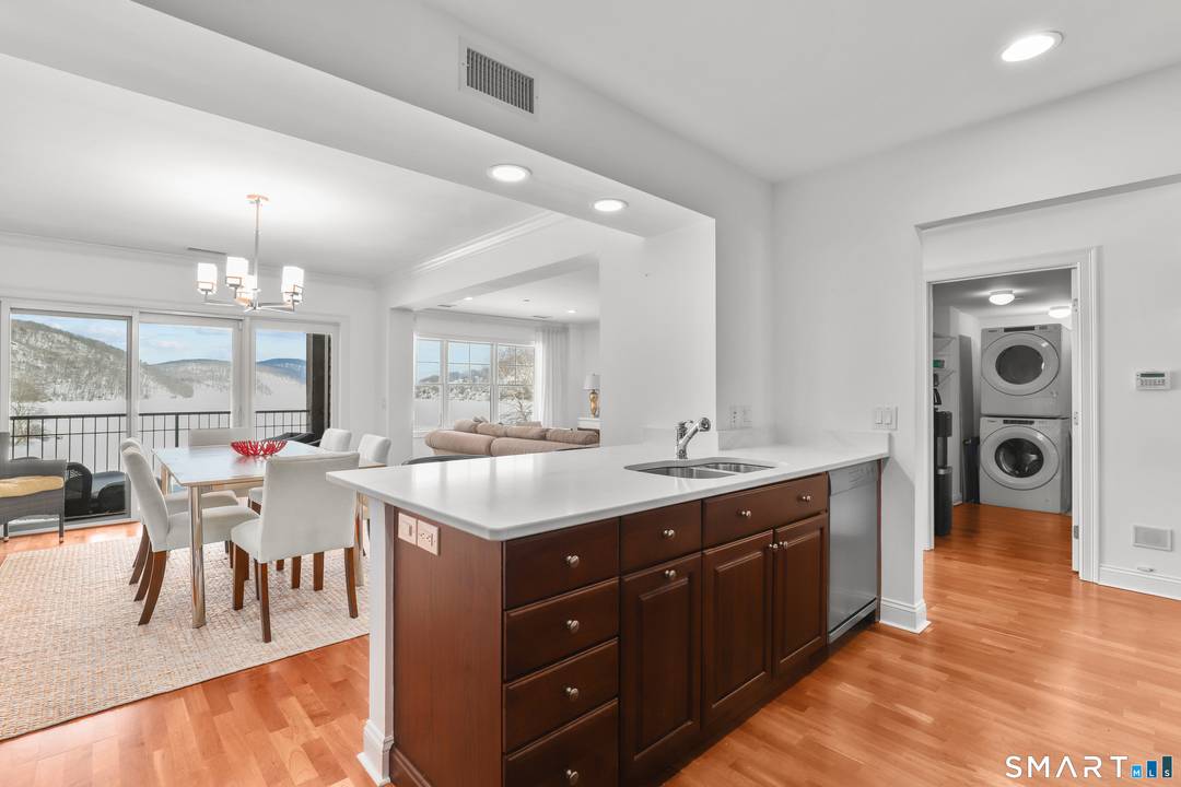 Set within the premier building at Poet's Landing, this beautifully appointed residence offers one of the most coveted vantage points in the community an unobstructed, straight down the lake view ...
