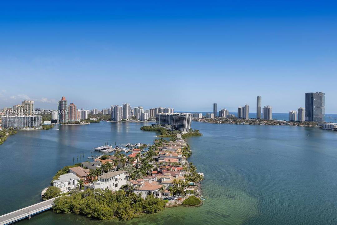 COMPLETELY RENOVATED ! ! and move in ready residence offers elevated luxury living in the prestigious guard gated community of Williams Island in Aventura.