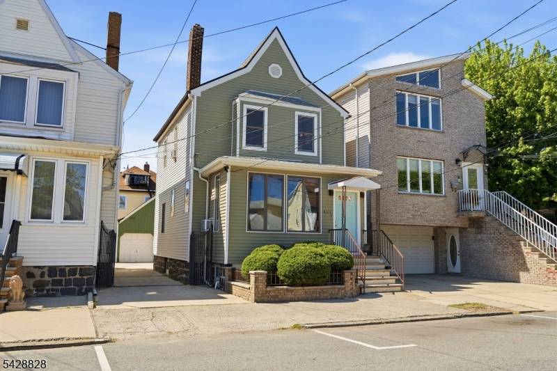 Rarely available in the Racetrack section, this single family home offers a two car garage with bonus space above, a finished basement, and exceptional flexibility at this price point.