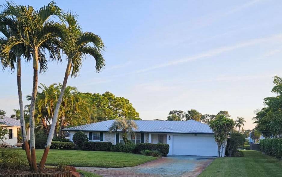 Huge reduction ! Great opportunity to own 4 bedroom house on 3 4 acre waterfront canal in North River Shores.