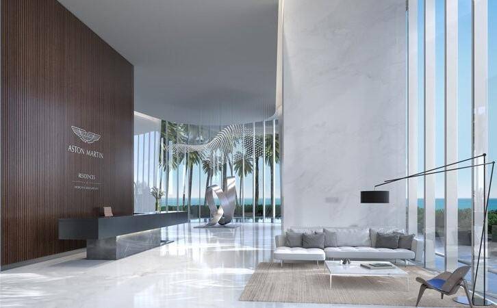 THE NEWLY BUILT ASTON MARTIN RESIDENCES, a stunning architectural designer building delights from every perspective, offering a panoramic view from the 19th FL.