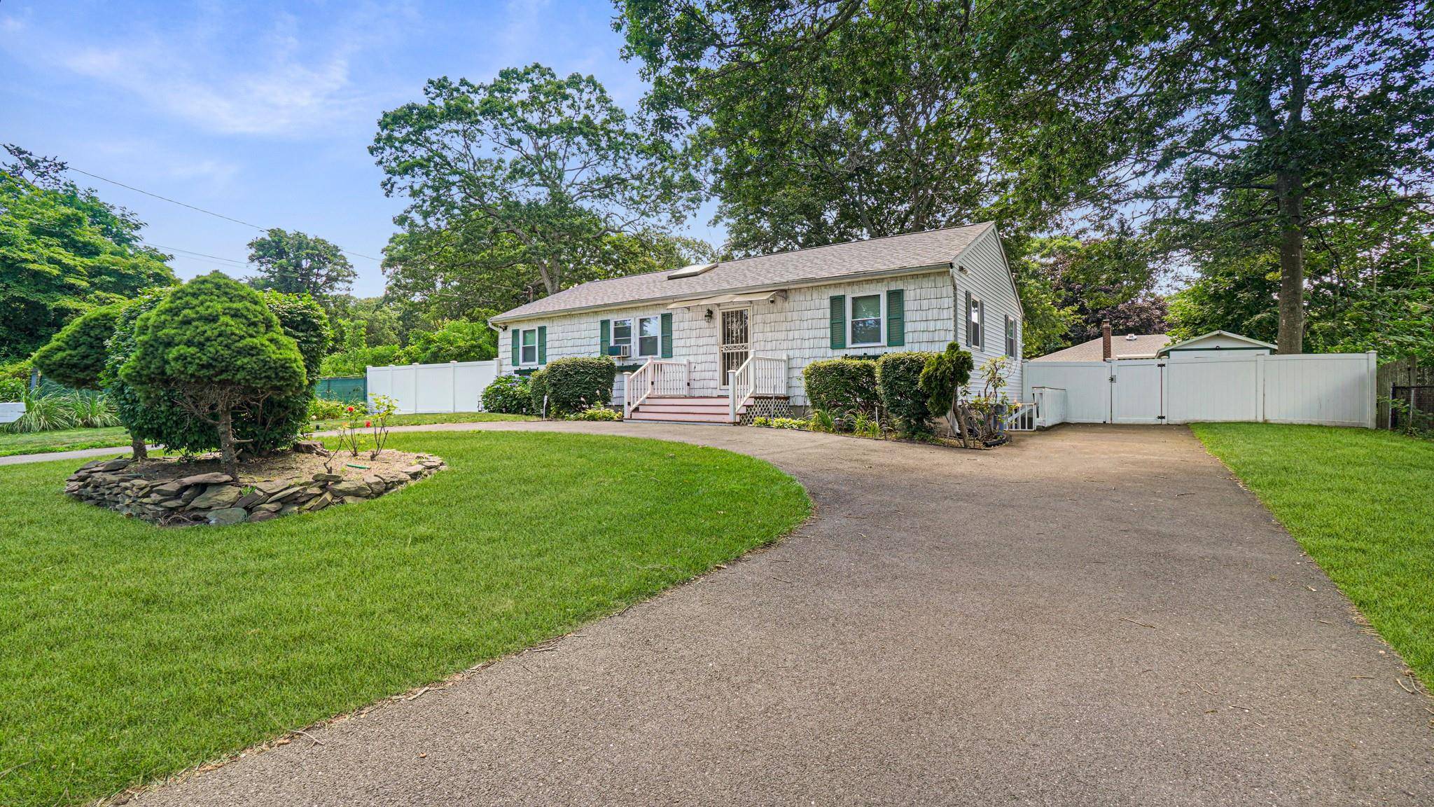 Nestled in vibrant Mastic Beach, NY, this charming 3 bedroom, 2 bath home offers a well thought out layout with a welcoming living room, separate dining room, and a functional ...