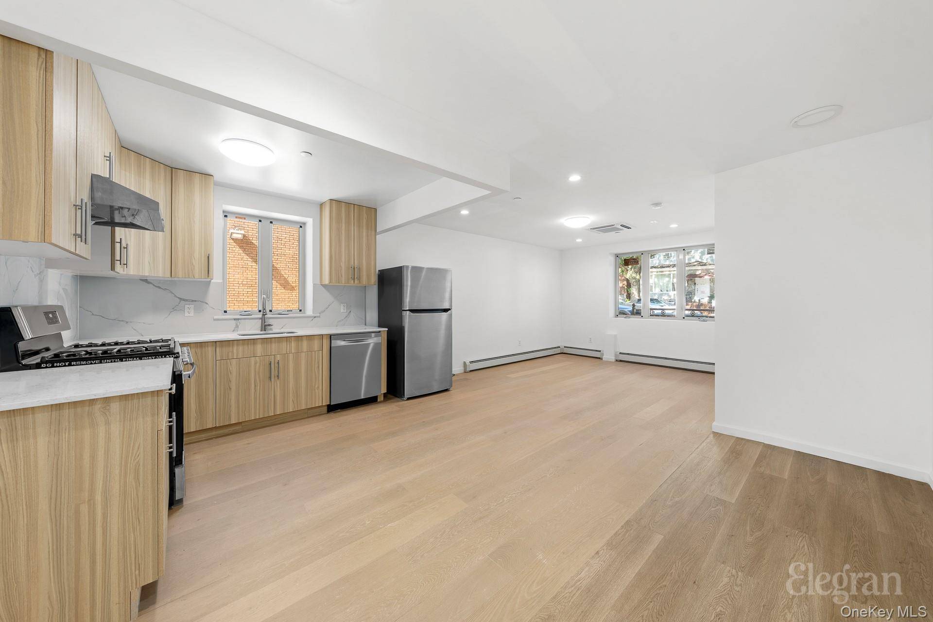 Welcome to this expansive duplex 4 bedroom apartment, located in a newly built 2022 boutique building in the heart of Woodside, Queens !