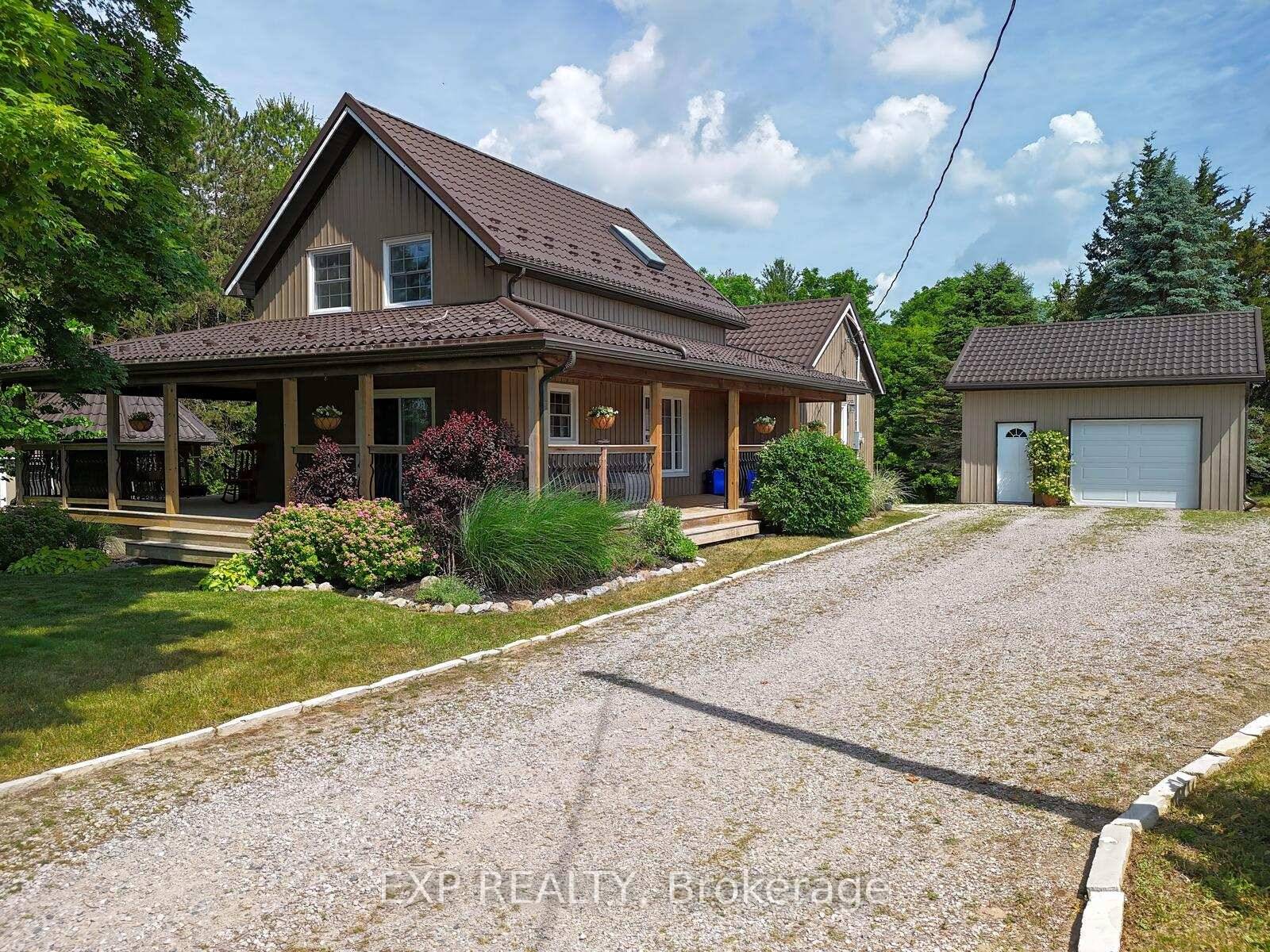 Welcome to your own slice of country charm on just under an acre, nestled on a quiet corner lot backing onto a small ravine.