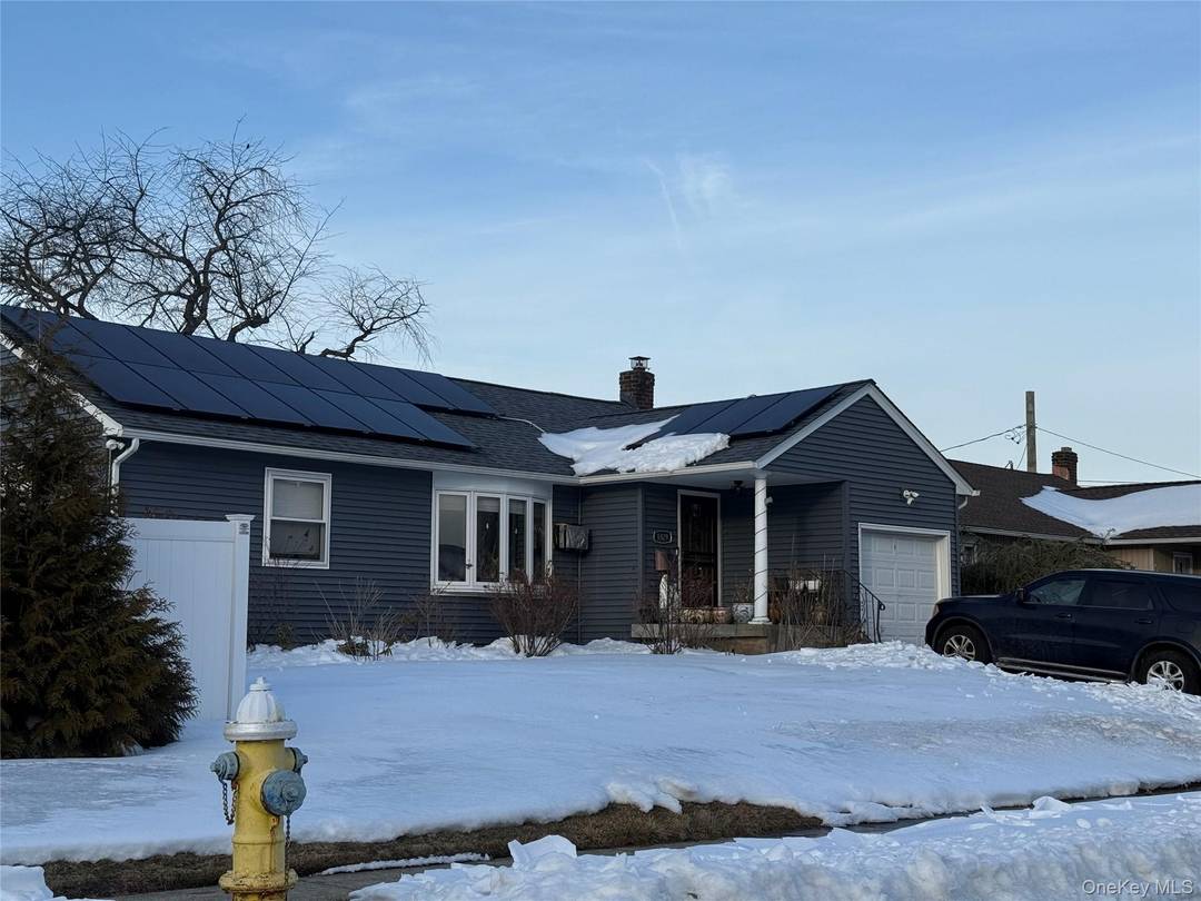 Stunning ranch offering a gorgeous kitchen, three bedrooms, and two updated baths.