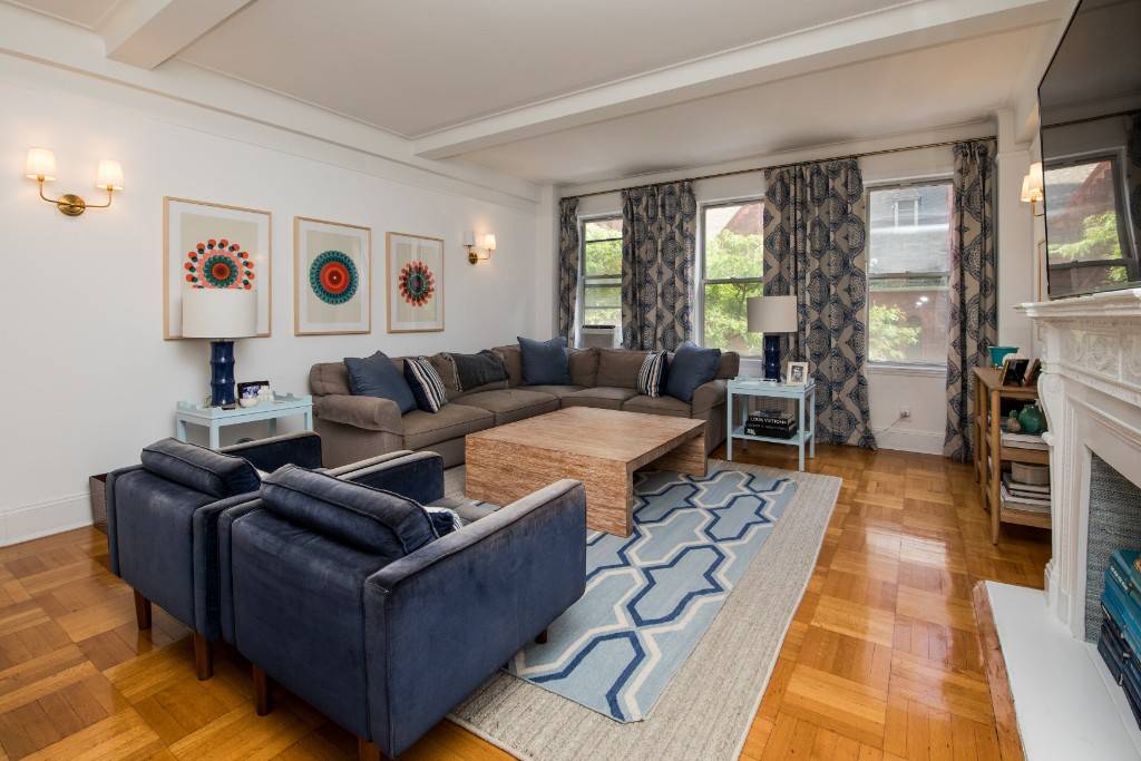 This sprawling four bedroom three bath apartment is ideally located in a beautiful pre war building in the heart of the Upper West Side.