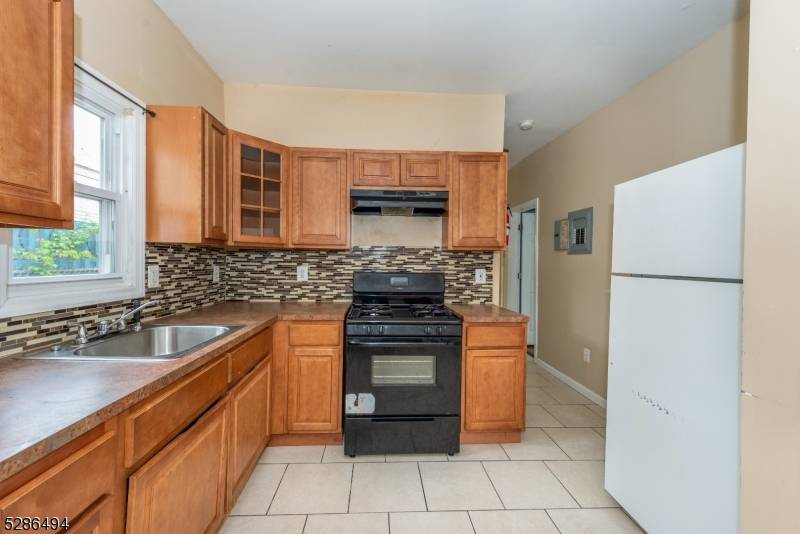 Welcome to this beautifully maintained 2 family home in Newark, NJ.