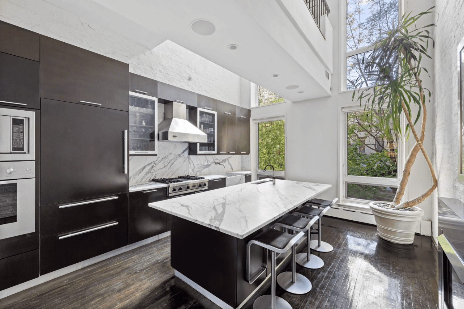 In the heart of Chelsea's vibrant gallery district, where the High Line meets the iconic Hotel Chelsea, an extraordinary townhouse opportunity emerges.