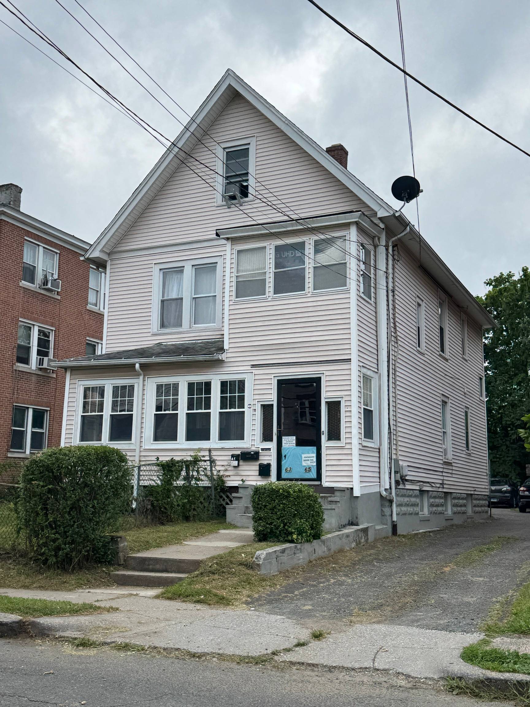 Two family in a great condition, finished attic combined with second floor unit, great investment property.