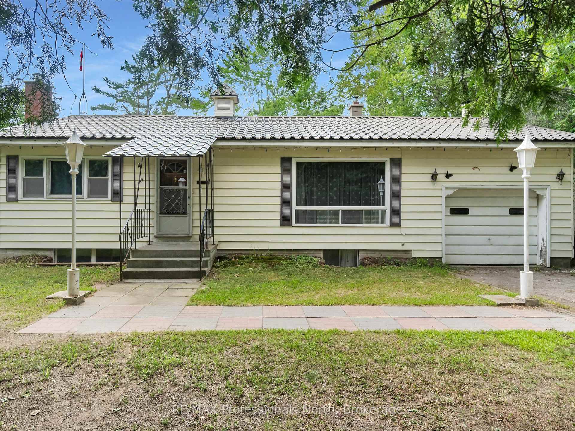 Perfectly situated just minutes from both Bracebridge and Gravenhurst, this solid older bungalow offers great potential for first time home buyers or investors alike.