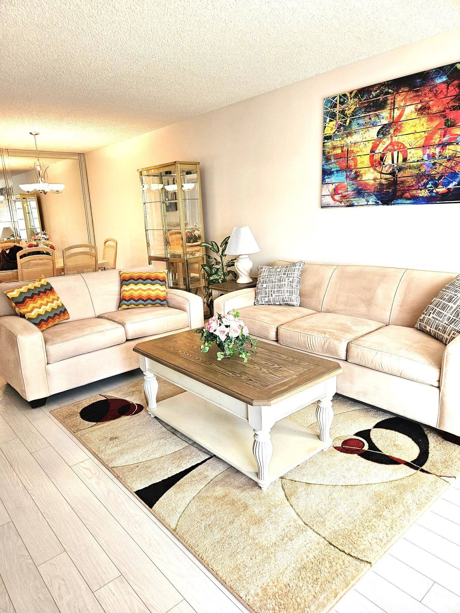 Beautiful Cozy, Active Lifestyle 55 Fully Updated 2nd Floor Condo End Unit, Nestled in the very private and most sought after Lakes of Delray Community.