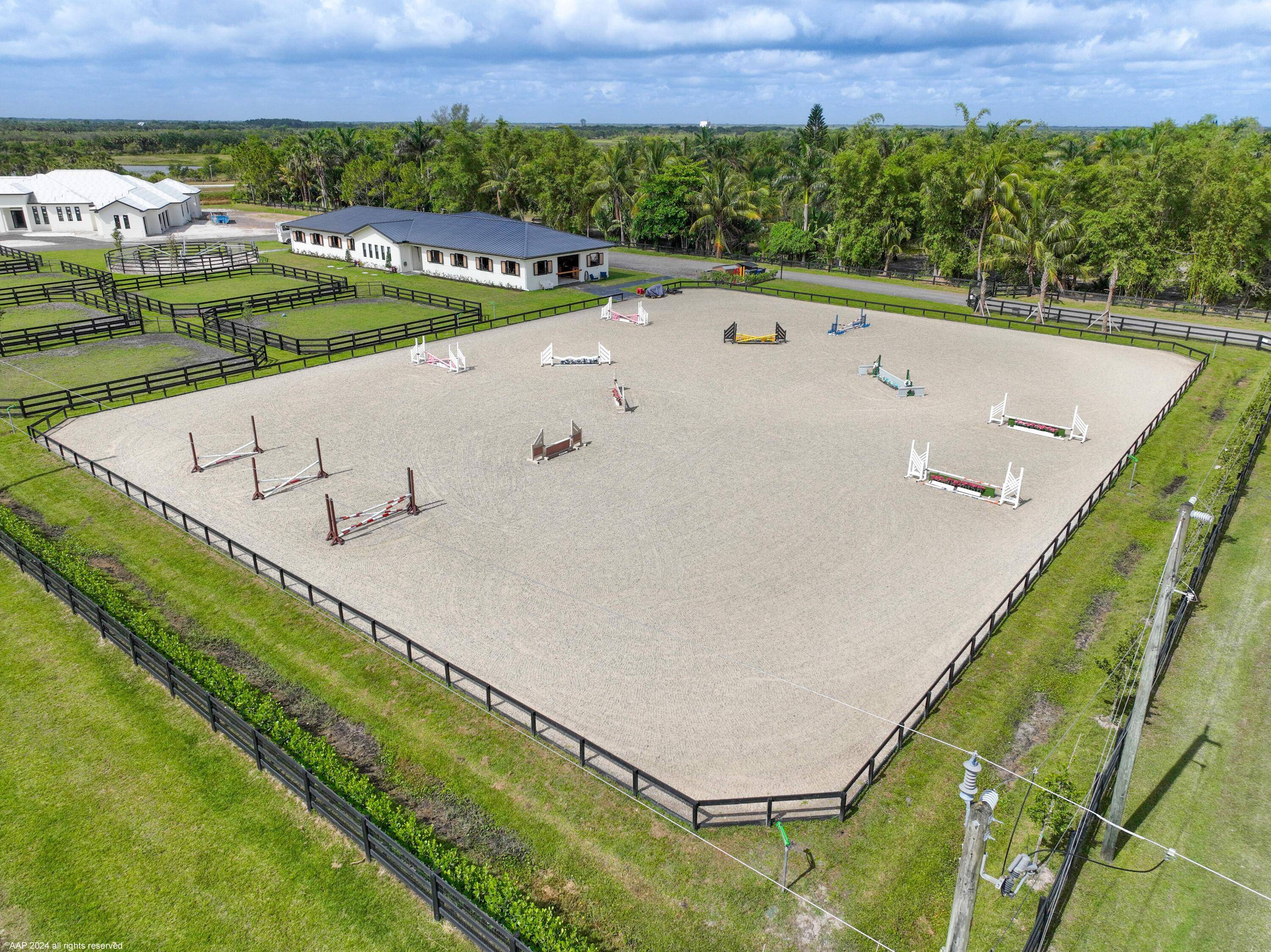 Have everything you need for a Wellington show season with this stunning, new professional horse facility only used one season located near the bridge to the show grounds !