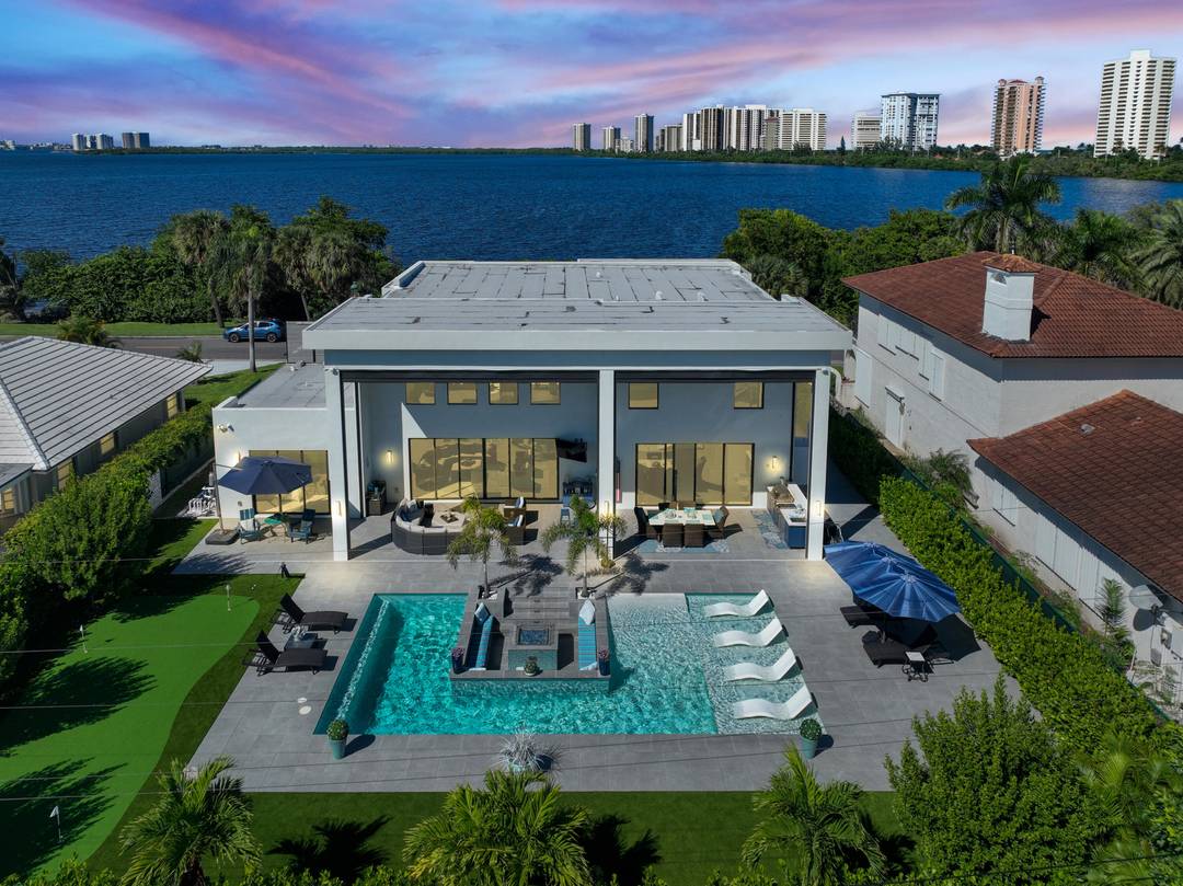 Experience elevated coastal living in this stunning custom modern residence featuring breathtaking water views, sleek architectural design, and resort style amenities throughout.