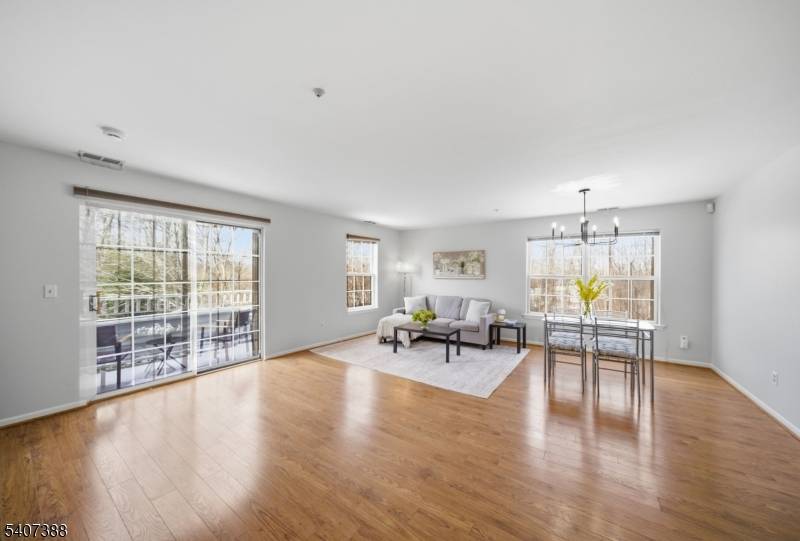 Welcome to Eden Lane. Step into this bright, freshly painted corner 2nd floor residence offering 2 bedrooms, 1.