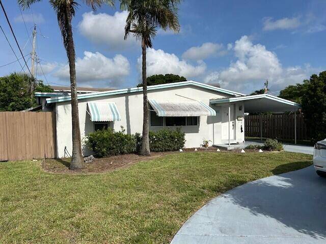 Just Listed ! This detached single family home is all about location, location, location with incredible potential !
