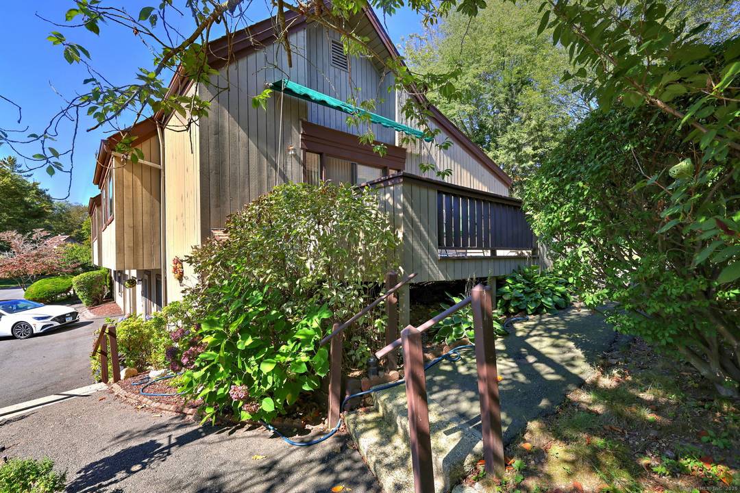 Highly sought after Thoreau model in Oronoque Village, ideally located for privacy and convenience.