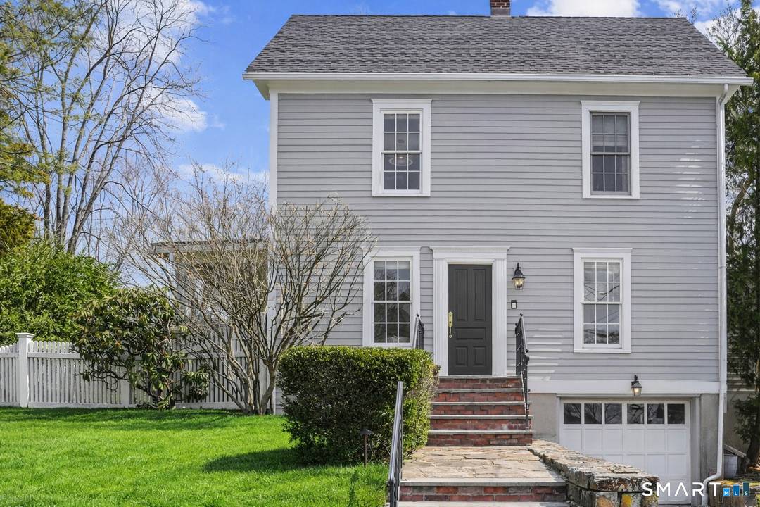 Nestled in the heart of historic Southport, this beautifully updated Colonial blends timeless charm with chic modern sophistication.