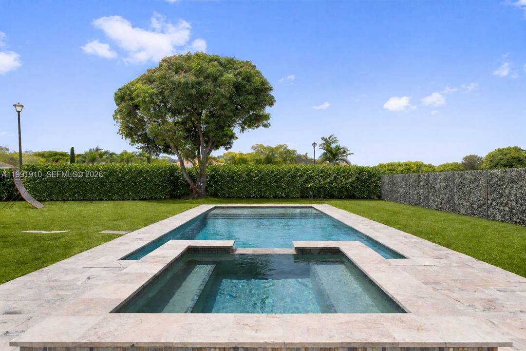 Tucked away in the enchanting enclave of Pelican Bay, just off Old Cutler Road in Cutler Bay, this residence feels like something out of a modern day fairy tale.