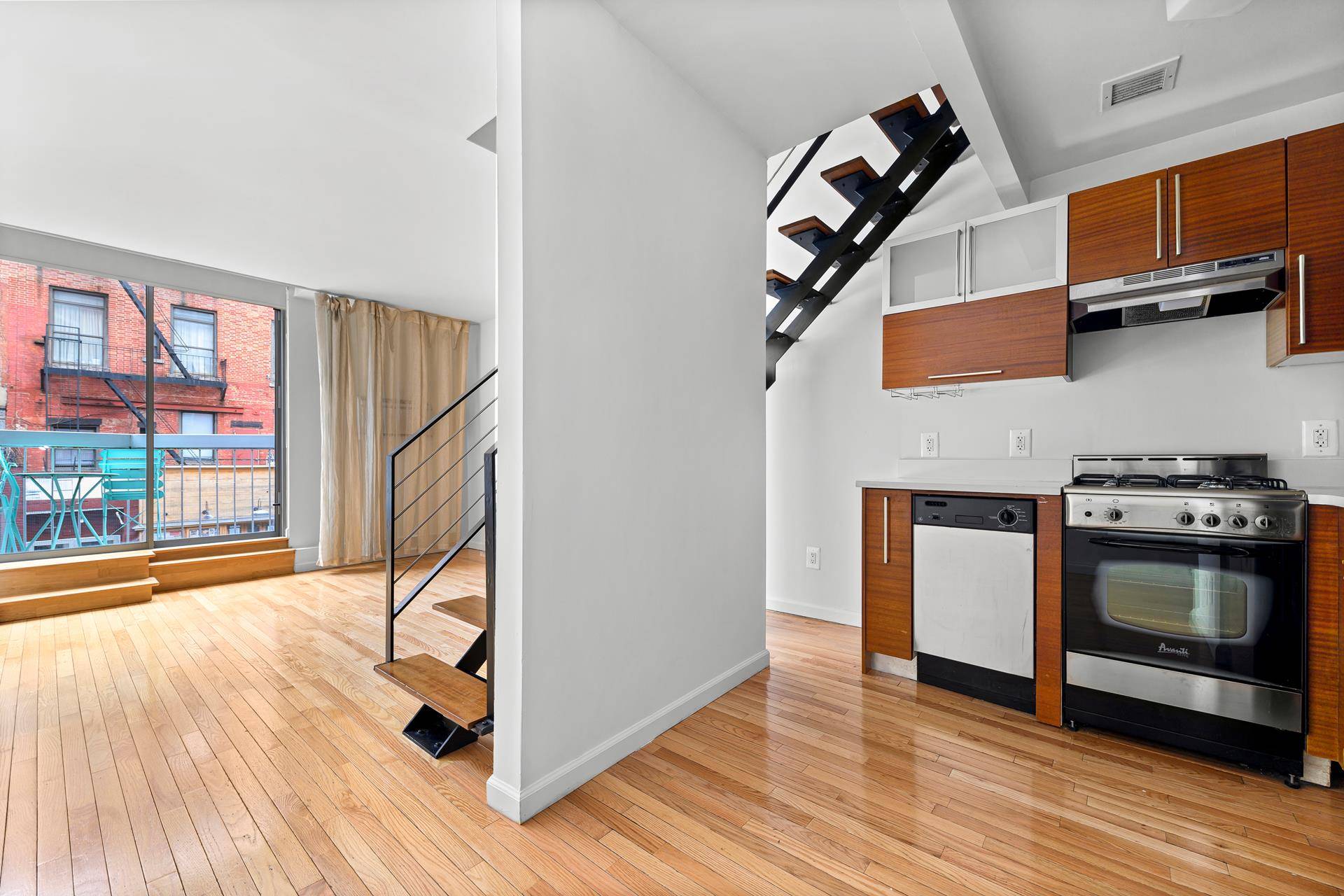 Welcome to this stunning, oversized duplex loft, bathed in sunlight and boasting its own private balcony !