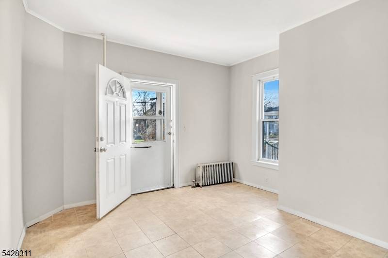 Welcome to this charming in town two family home offering comfort, versatility, and an exceptional backyard oasis.