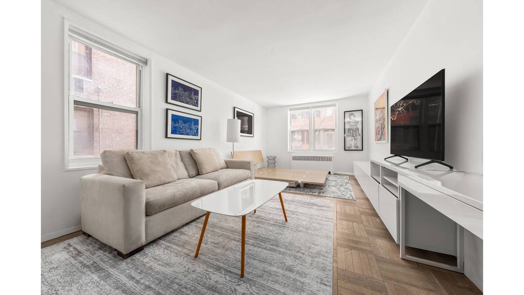 Welcome to Residence 1G at 100 Bank Street, a charming studio set on one of the West Village's most desirable tree lined blocks.