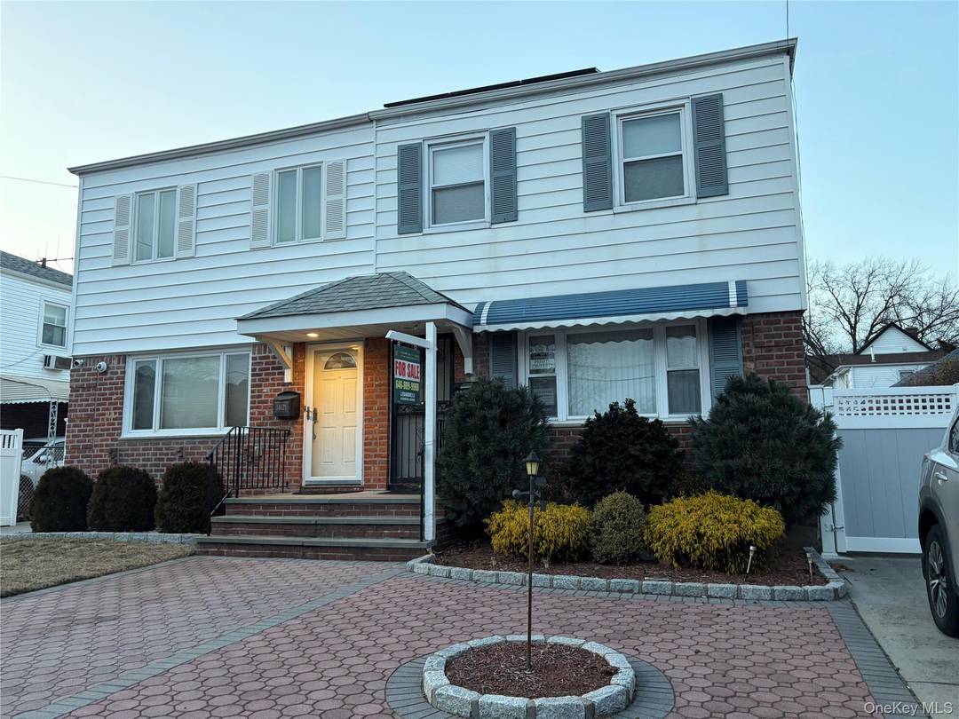 Charming and well maintained home located on a convenient residential block in Flushing.