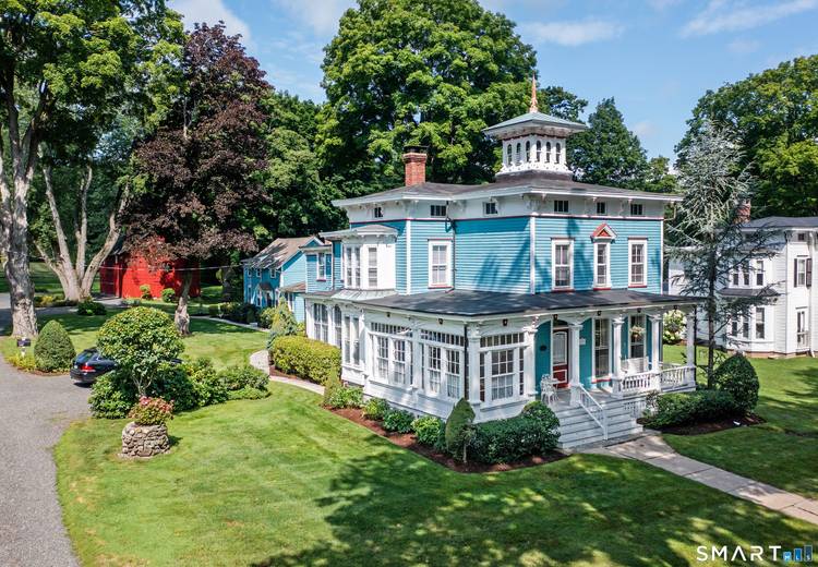 Welcome Home to an incredible opportunity to live on Ridgefield's Historic Main Street !