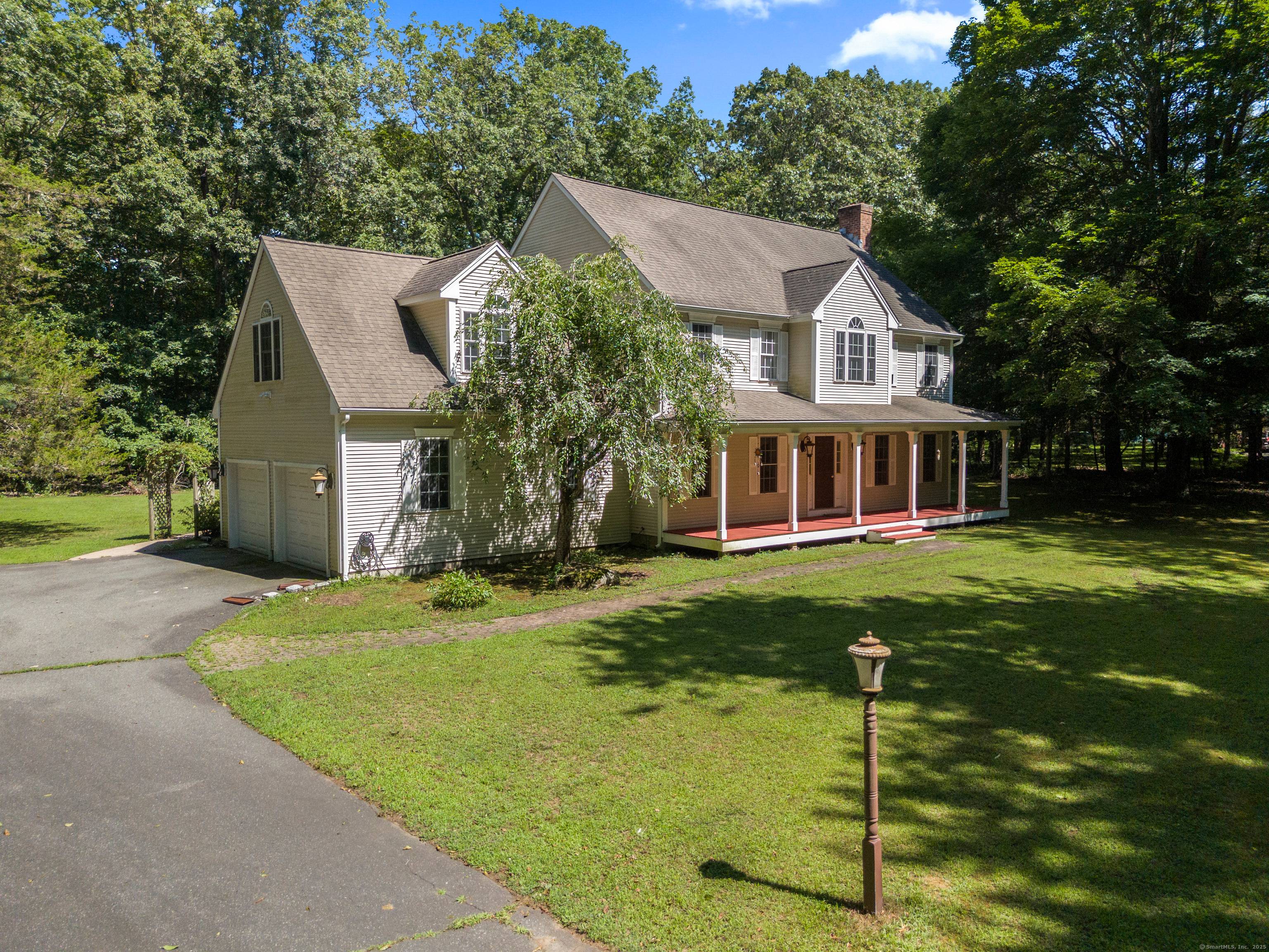 Nestled in the heart of a picturesque shoreline town, this beautiful Colonial home offers the perfect blend of timeless charm and modern comfort.