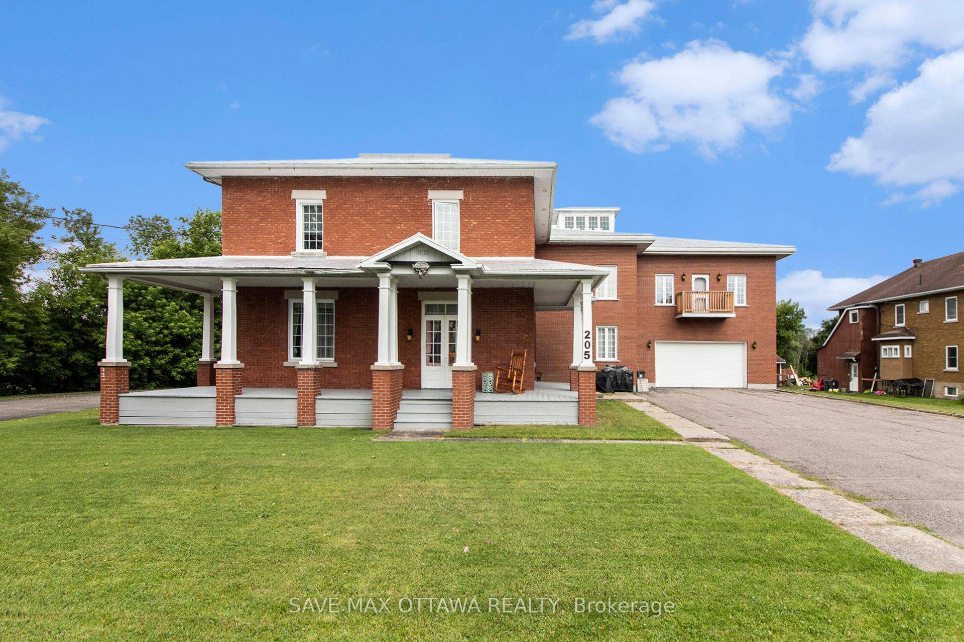 This beautifully updated Century home sits on a prime RIVERFRONT lot along the scenic Nation River.