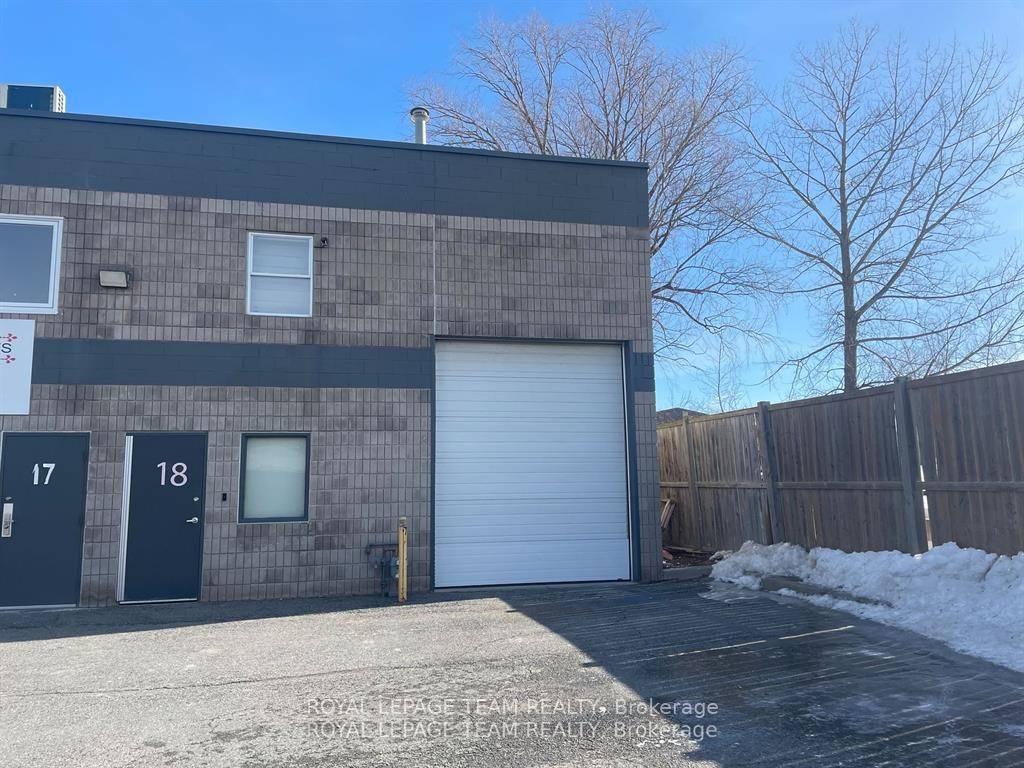 Commercial Industrial End Unit in Findlay Creek area of the city with a 12 foot garage door.