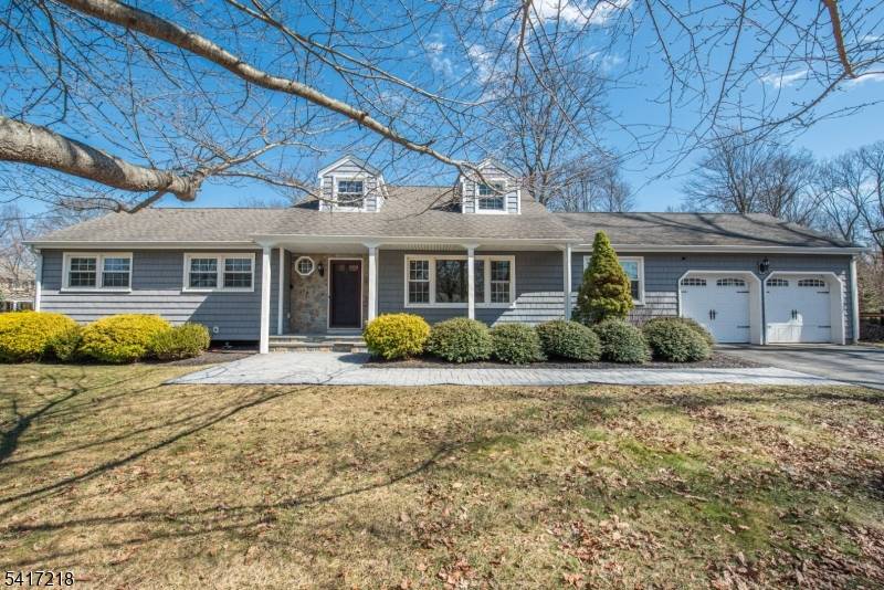 Welcome to this sun filled, meticulously maintained Expanded Ranch, a hidden gem in Randolph.