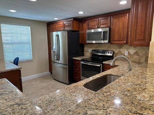 Resort style living with fabulous lake and golf course views.
