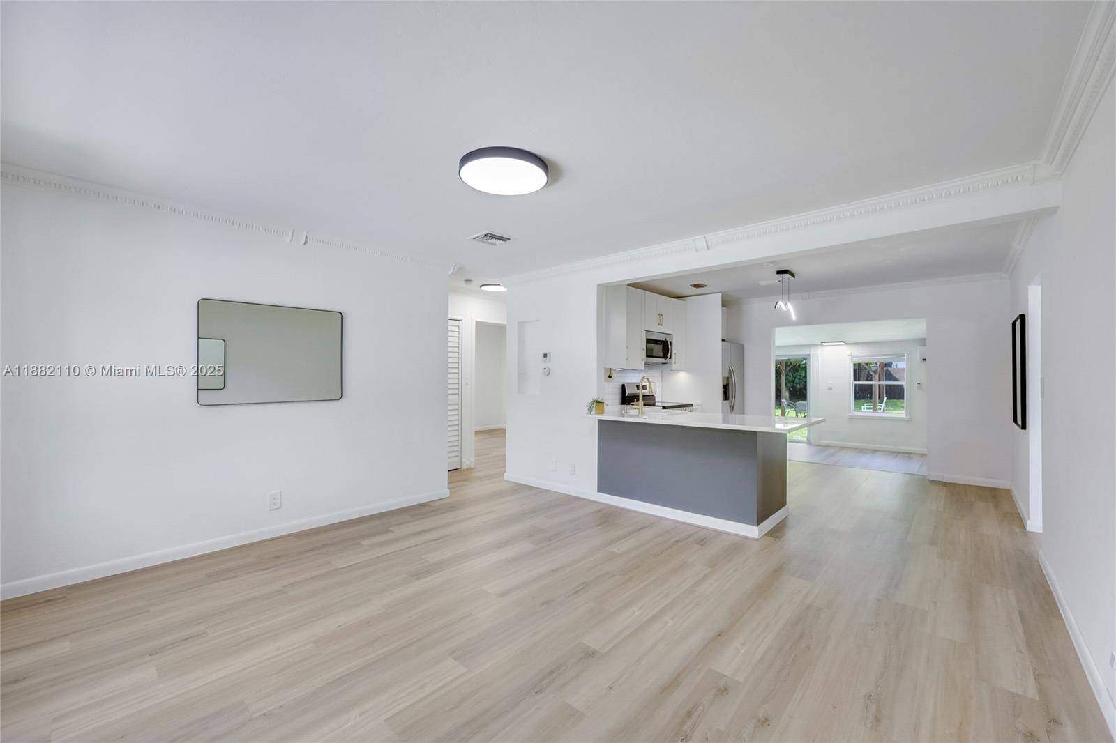Tastefully remodeled South Middle River single family home with 4 bedrooms, 3 full baths and a family room.