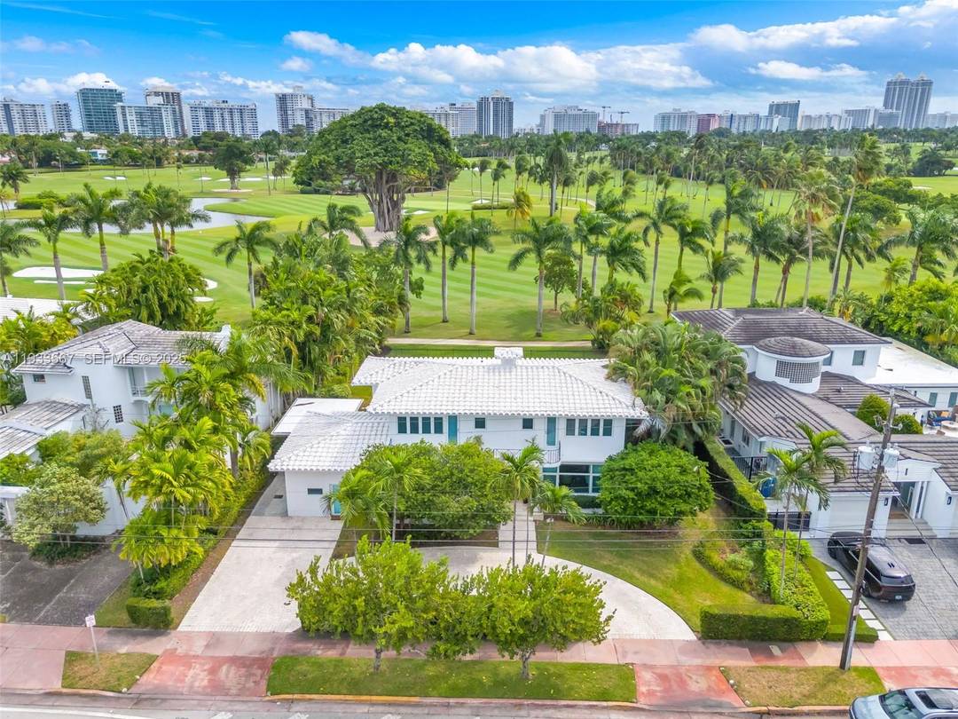 Discover the potential of this spectacular property on the 3rd hole of the golf course at the private La Gorce Country Club.