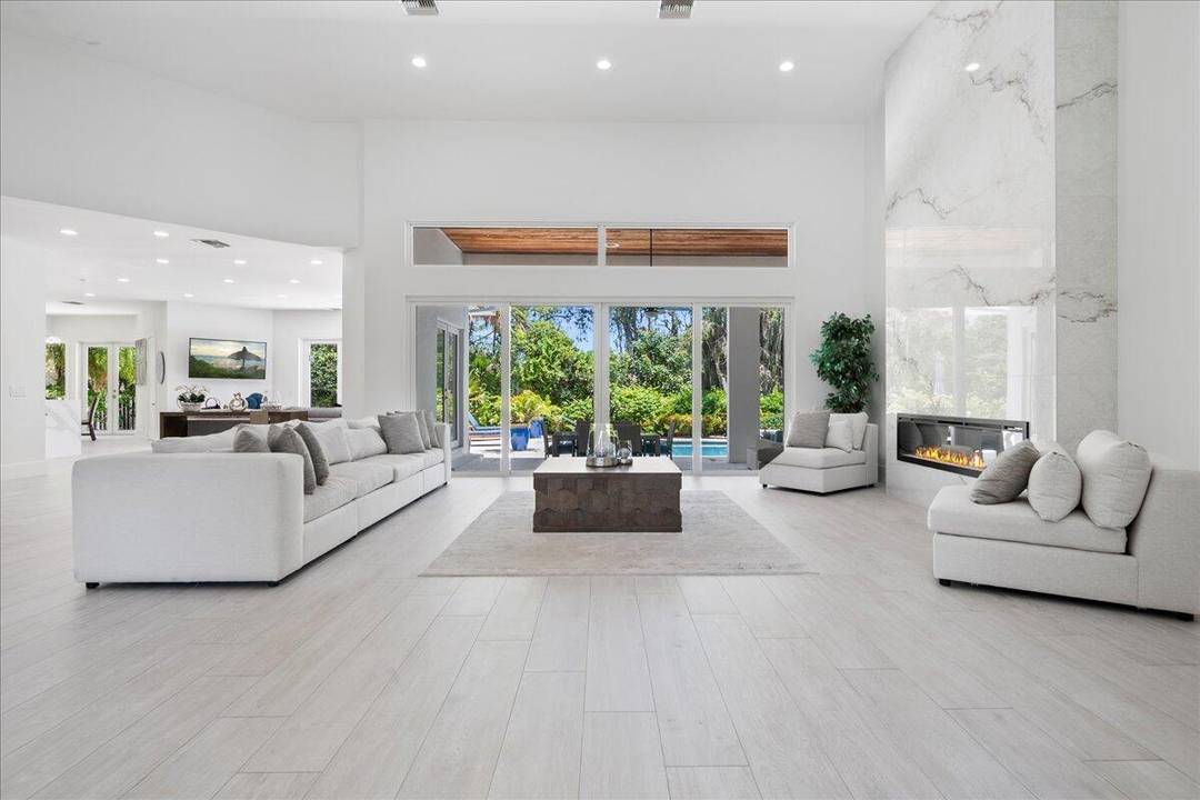 Ideal for equestrian enthusiasts, this meticulously renovated residence is located in the sought after Golf Brook enclave within Palm Beach Polo and Country Club.