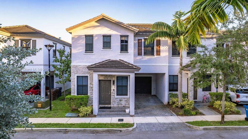 Contemporary remodeled townhouse with luxury finishes throughout.