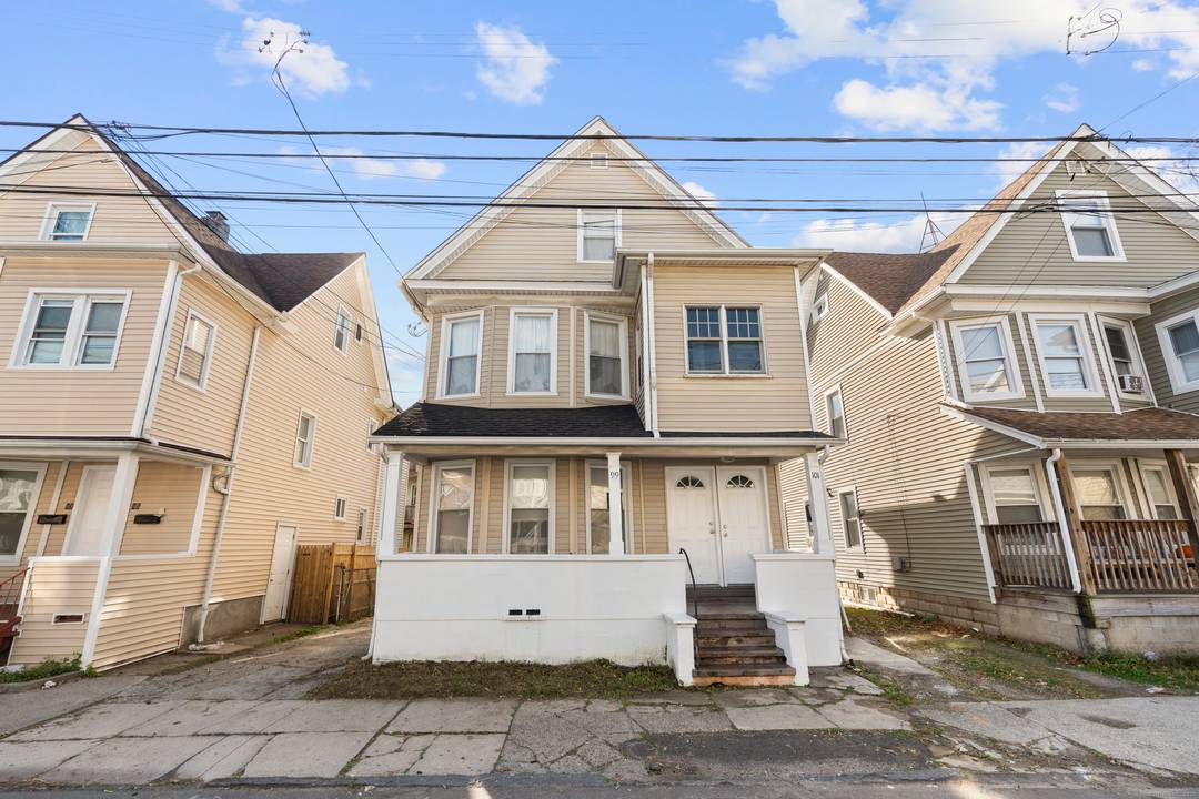 Step into this well maintained, oversized two family home !